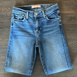7 for All Mankind. Size 26. The denim that hugs your body perfectly.